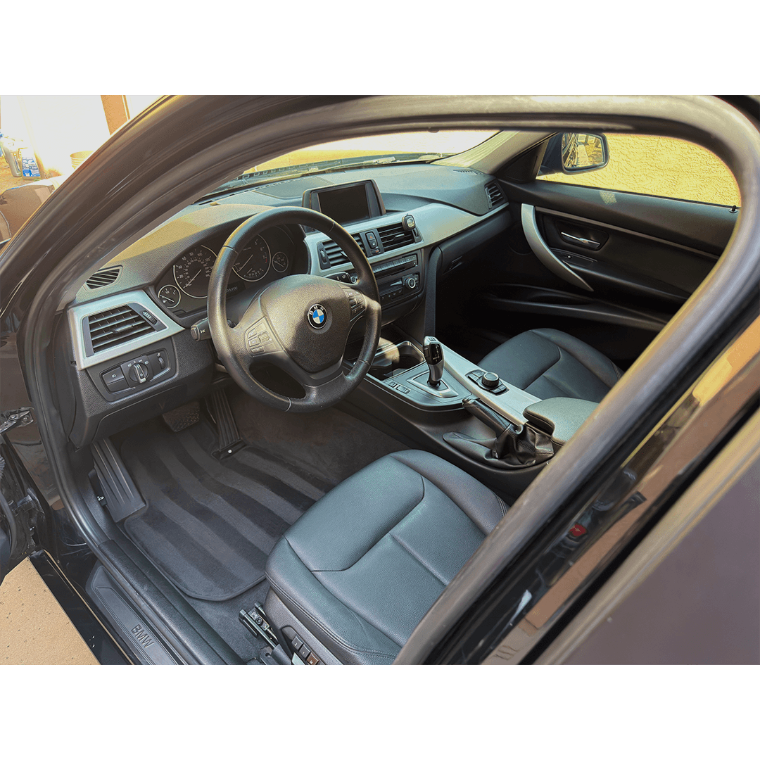 BMW interior — front cabin from passenger side after detail